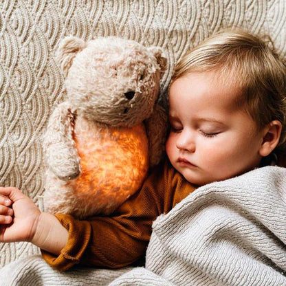 Peluche Moonie Oso Orgánico con Luz y Sonido Sand Natur